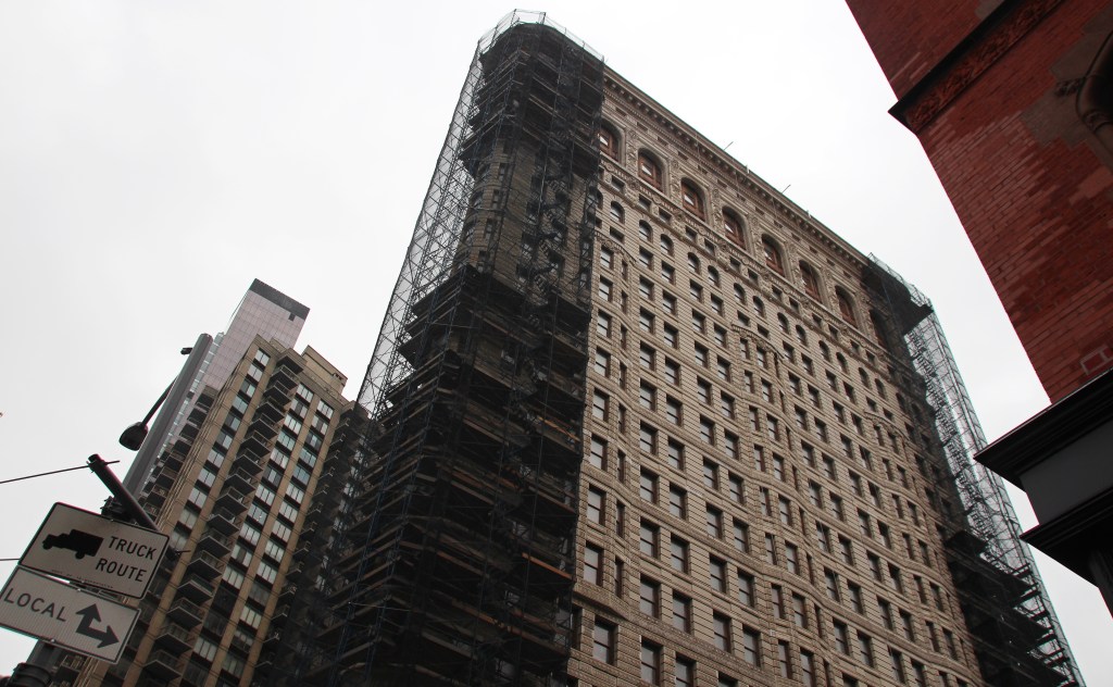 The partially scaffolded Flatiron Building in Manhattan's Flatiron District on March 14, 2023.