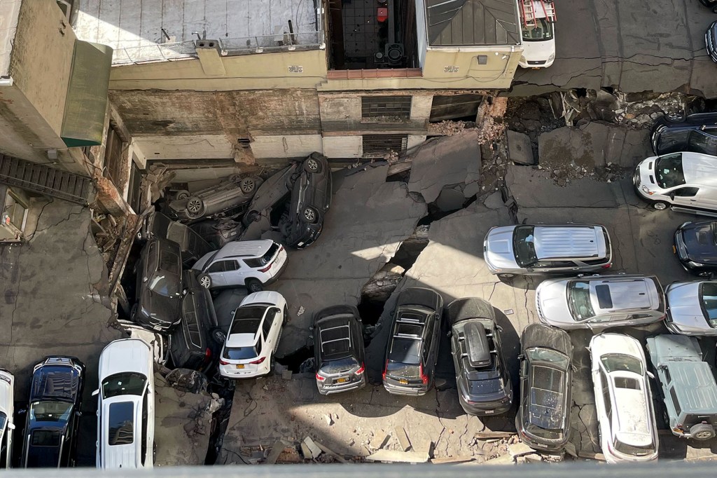 Multiple people trapped and injured at a parking garage collapse at 37 Ann Street, down at Ann and Williams Street in the Financial District.