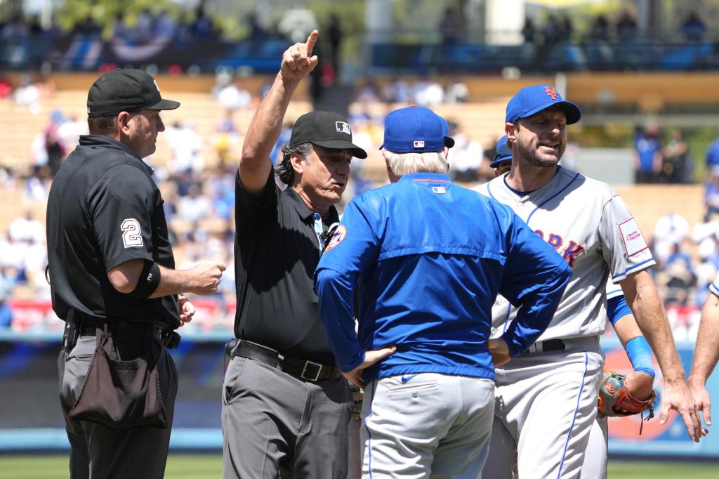 Max Scherzer argues with umpires before being ejected from the Mets' win over the Dodgers on April 19.