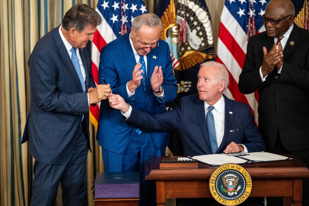 Biden and Joe Manchin earlier this month.