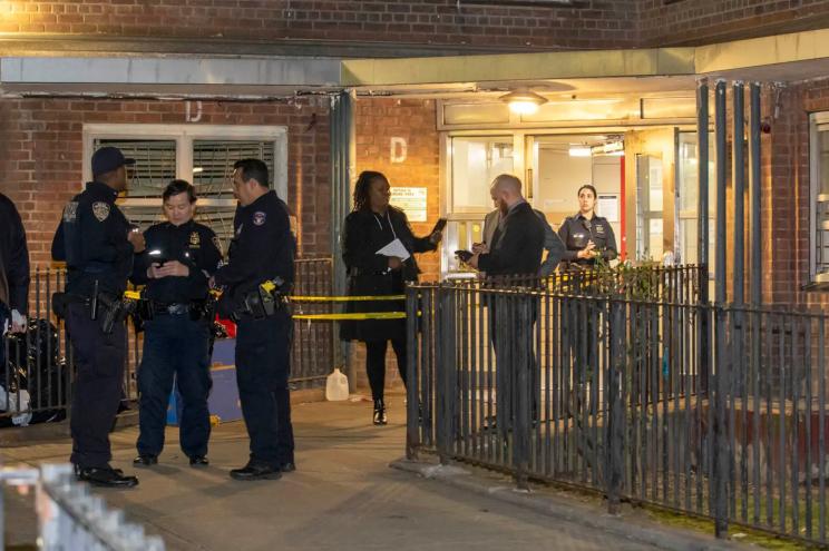 Police respond to the scene of the deadly shooting within NYCHA’s St. Nicholas Houses on West 131st Street near Adam Clayton Powell Jr. Blvd.