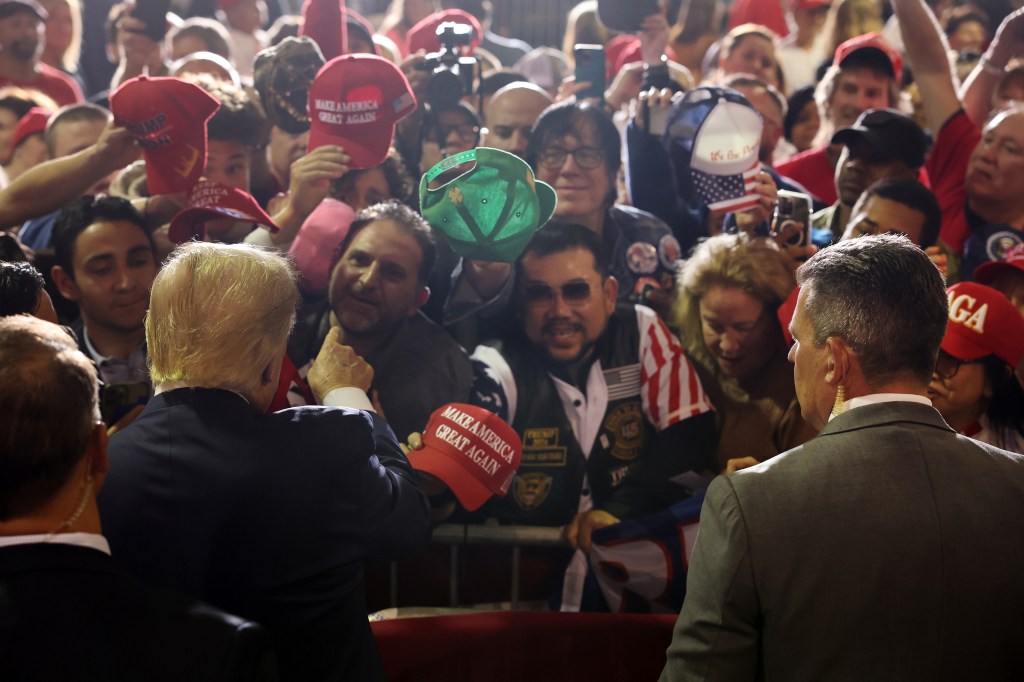 Donald Trump greets supporters at a campaign rally on Thursday.