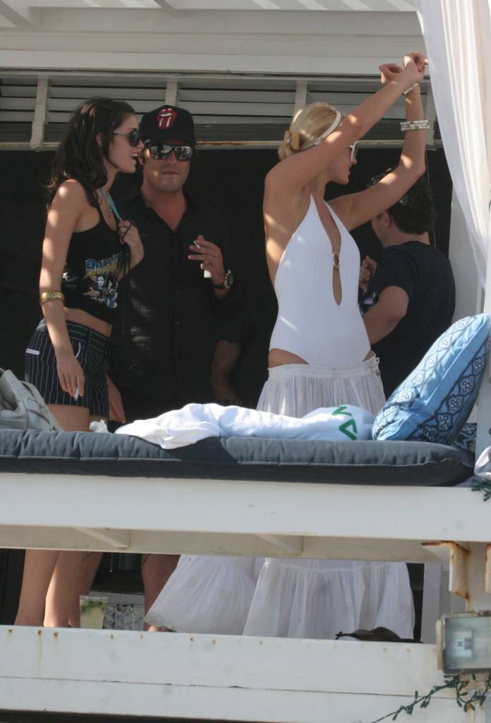 Patty's nephew, Brandon Davis, seen with Paris and Nicky Hilton at the Smashbox Polaroid Beach House in Malibu in 2006.