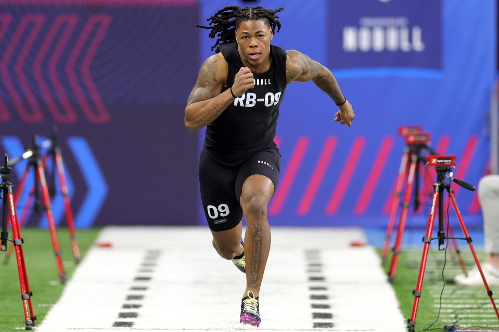 Jahmyr Gibbs of Alabama participates in the 40-yard dash during the NFL Combine