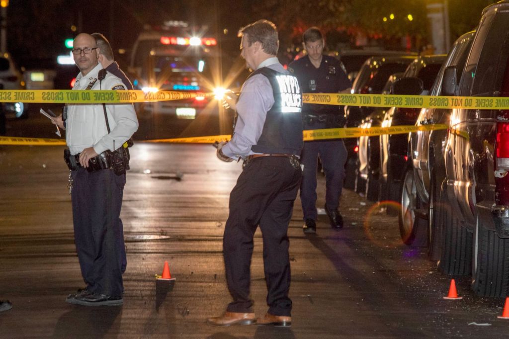 Police investigate the scene of a shooting near 2253 Ryer Ave in the Fordham Heights.