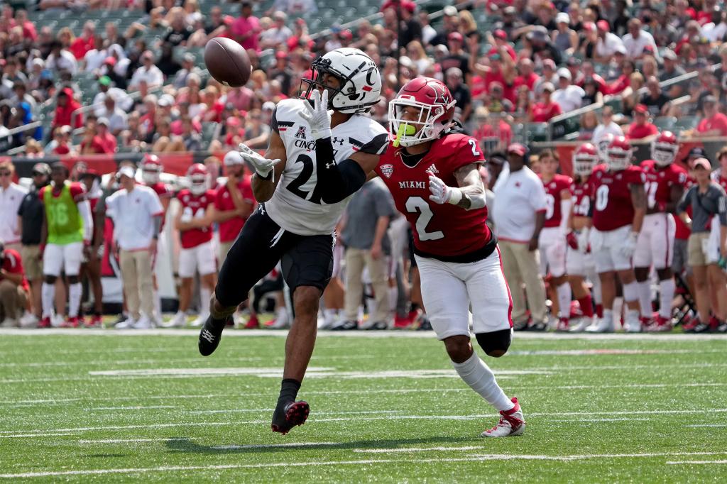 Tyler Scott recorded 899 receiving yards and nine touchdowns at Cincinnati in 2022.