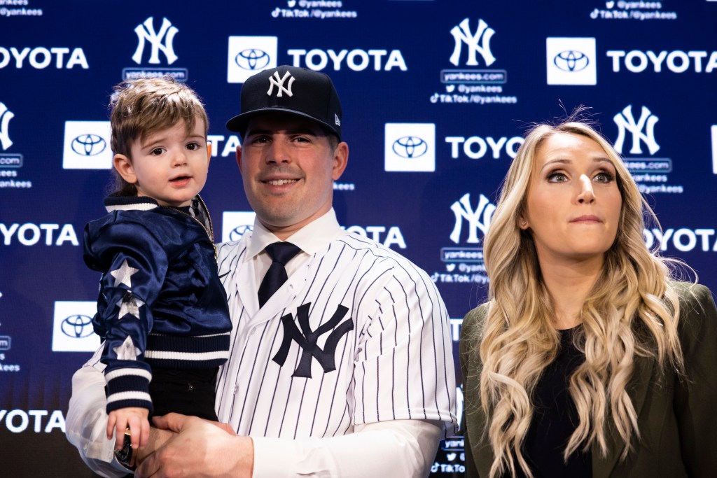 Carlos Rodon with son Bo and wife Ashley.