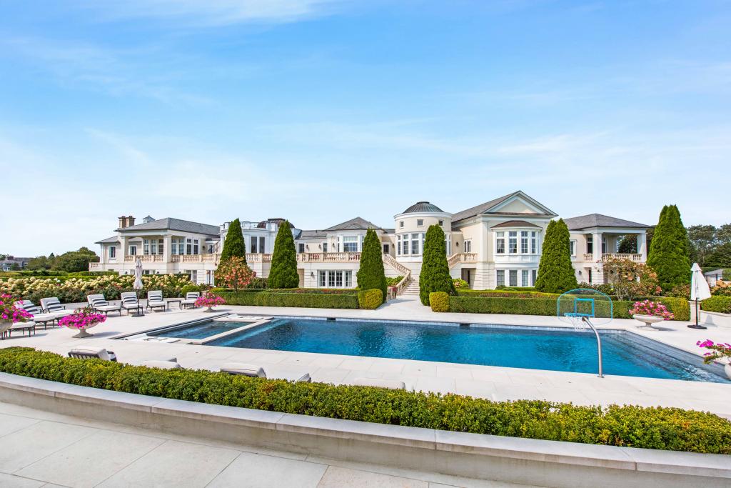 The massive 17,173-square-foot abode has a saltwater gunite pool. 