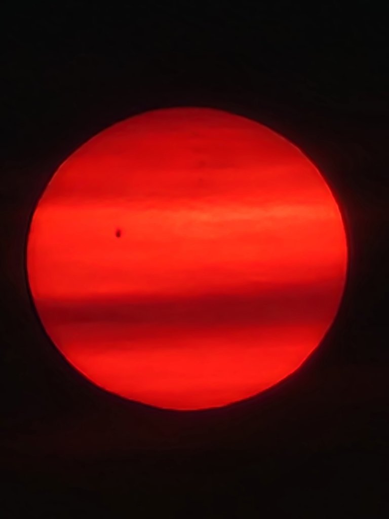 A red sun rose over Binghamton, NY Monday.