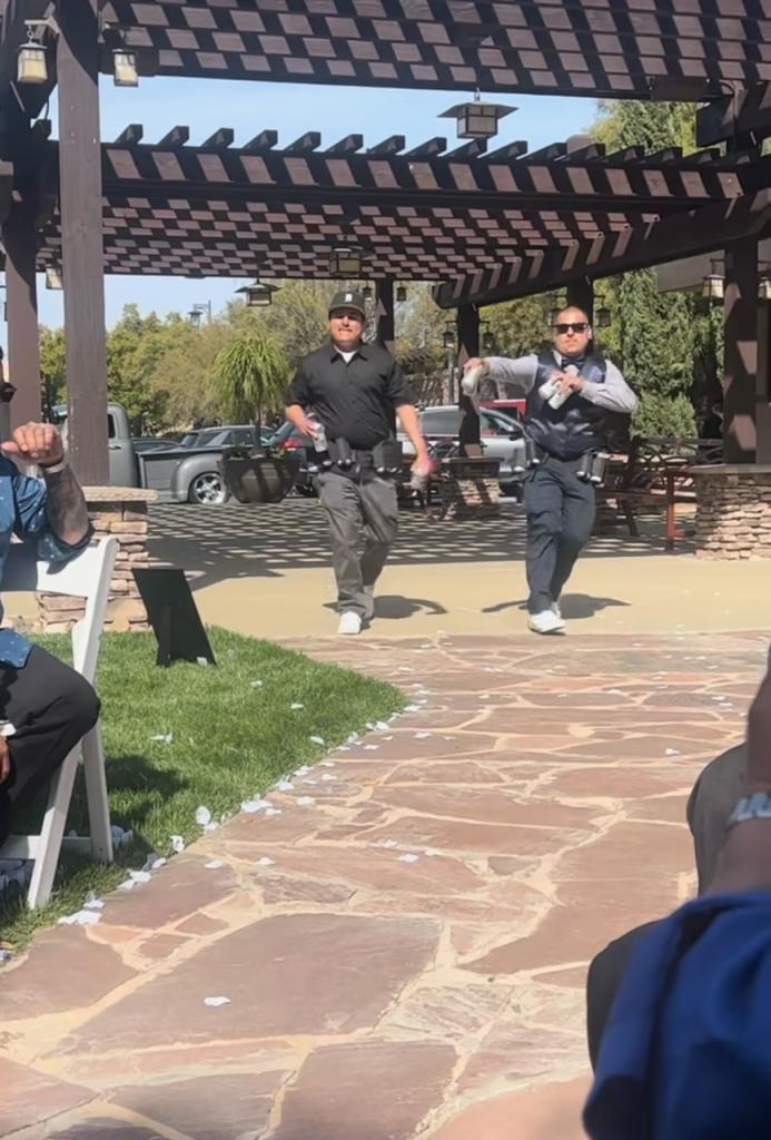 David Ayala (left) and Christian Ayala serving as beer boys at cousin Kristina Quiroz's April 8, 2023 wedding in Temecula, California. 