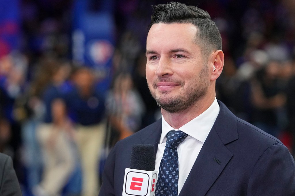 ESPN analyst JJ Redick looks on ahead of a Knicks-Sixers game in March 2022.