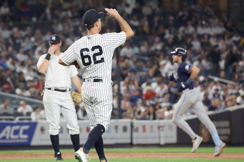 Ryan Weber (62) reacts after giving up a home run against the Rays on Thursday.