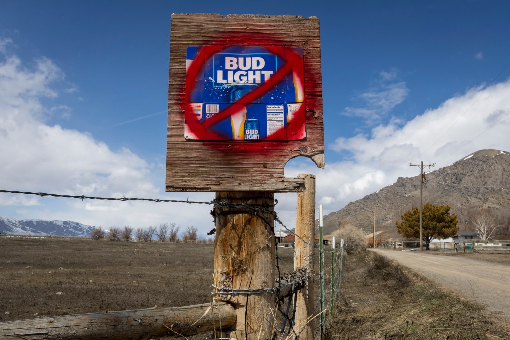  A sign disparaging Bud Light beer is seen along a country road on April 21, 2023 in Arco, Idaho. Anheuser-Busch, the brewer of Bud Light has faced backlash after the company sponsored two Instagram posts from a transgender woman.