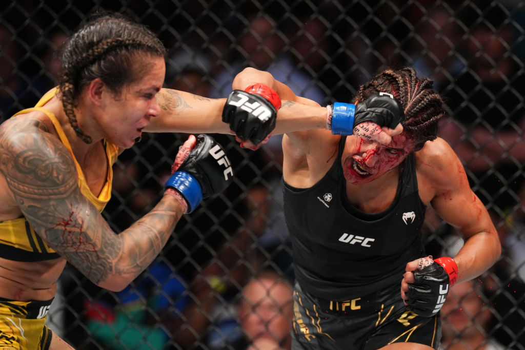 Amanda Nunes and Julianna Pena fight at UFC 277 in 2022.