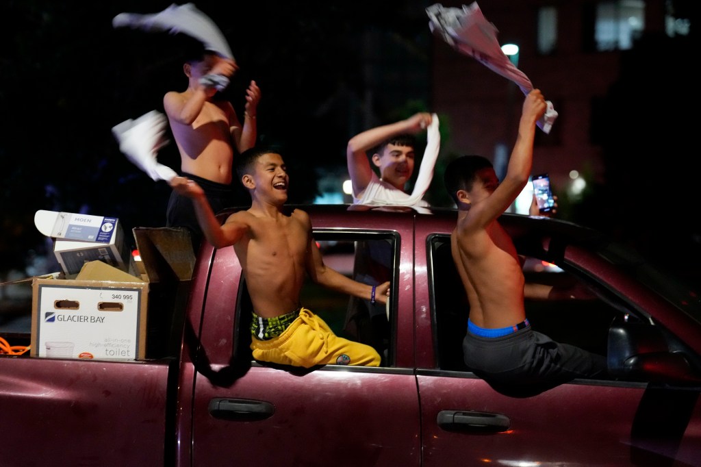 People celebrate after the Denver Nuggets won the NBA Championship with a victory over the Miami Heat in Game 5 of basketball's NBA Finals, Monday, June 12, 2023, in Denver.