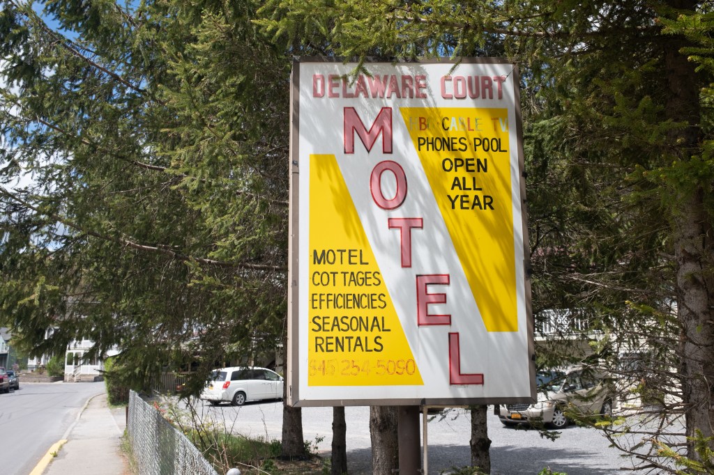 A sign advertising a seasonal motel.