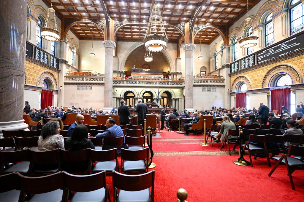 Members of the New York Assembly work on legislative bills in the Assembly Chamber before Gov. Kathy Hochul presents her executive state budget at the state Capitol Wednesday, Feb. 1, 2023, in Albany, N.Y.