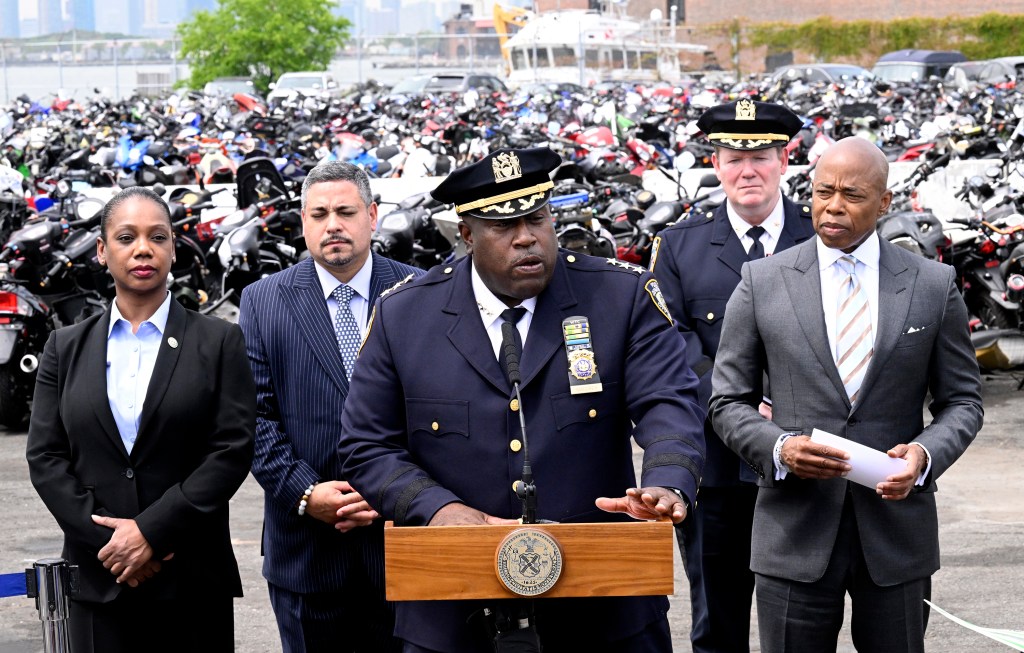 The PC and Adams with other NYPD brass.