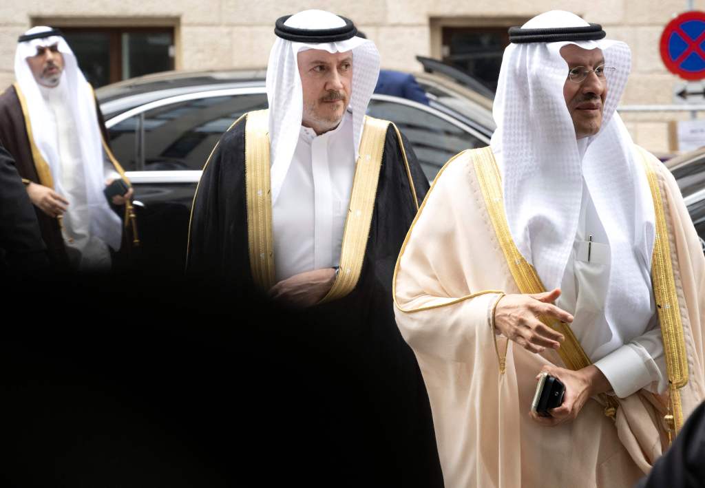 Saudi Minister of Energy Prince Abdulaziz bin Salman al-Saud, right, at  an OPEC meeting in June.