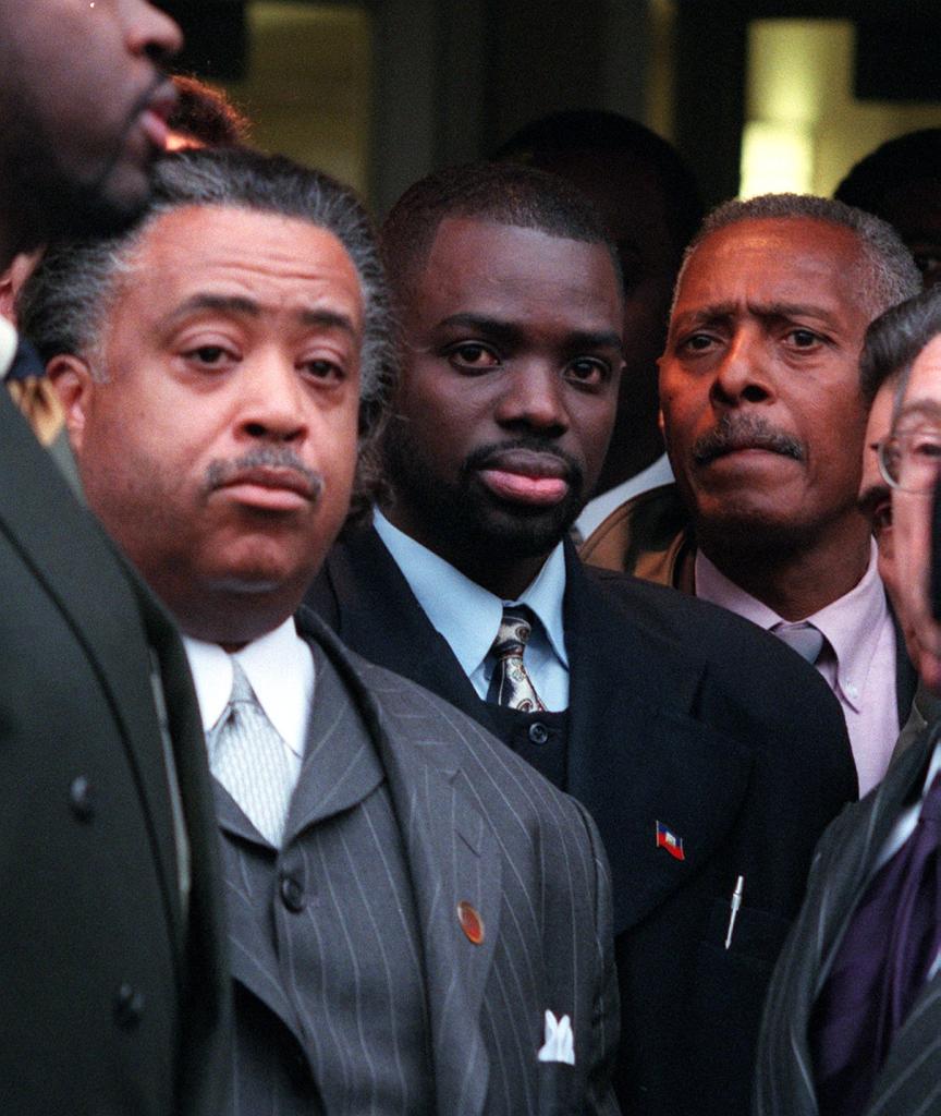 Louima and Al Sharpton after Louima's assault. 