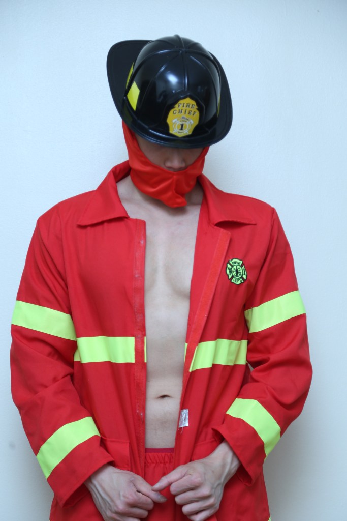 Andrew in fireman stripper garb.