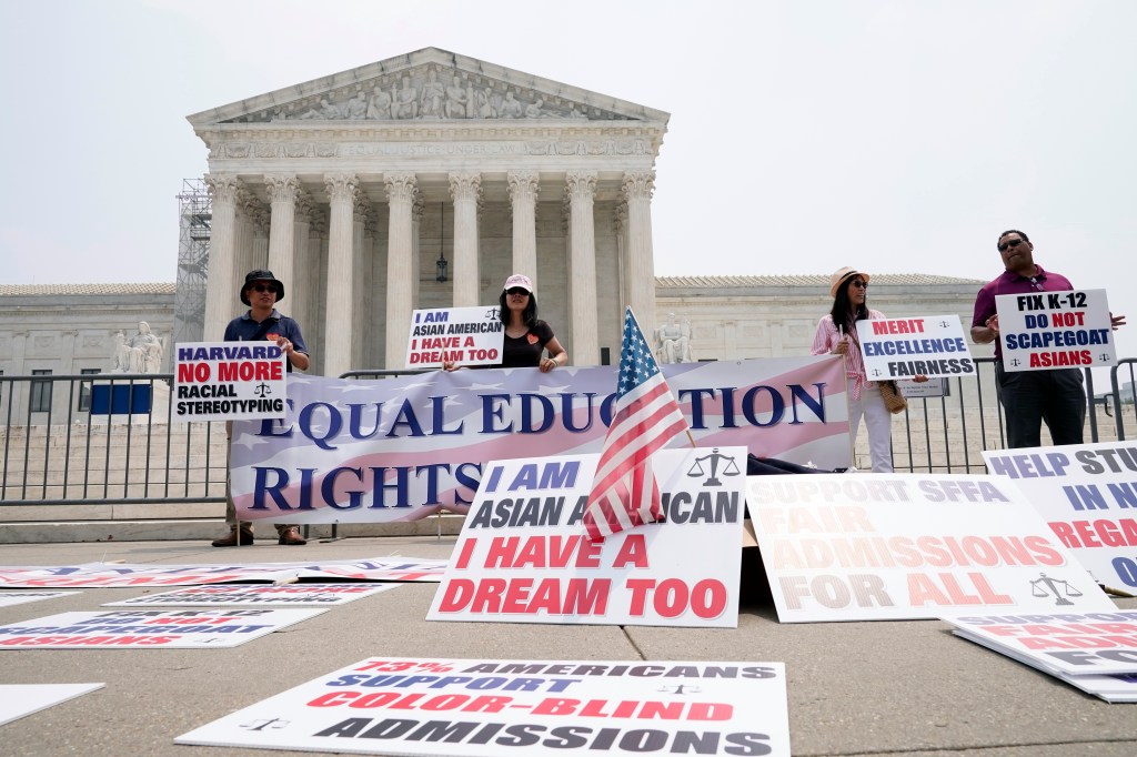 People protesting against affirmative action outside of the Supreme Court on June 29, 2023.