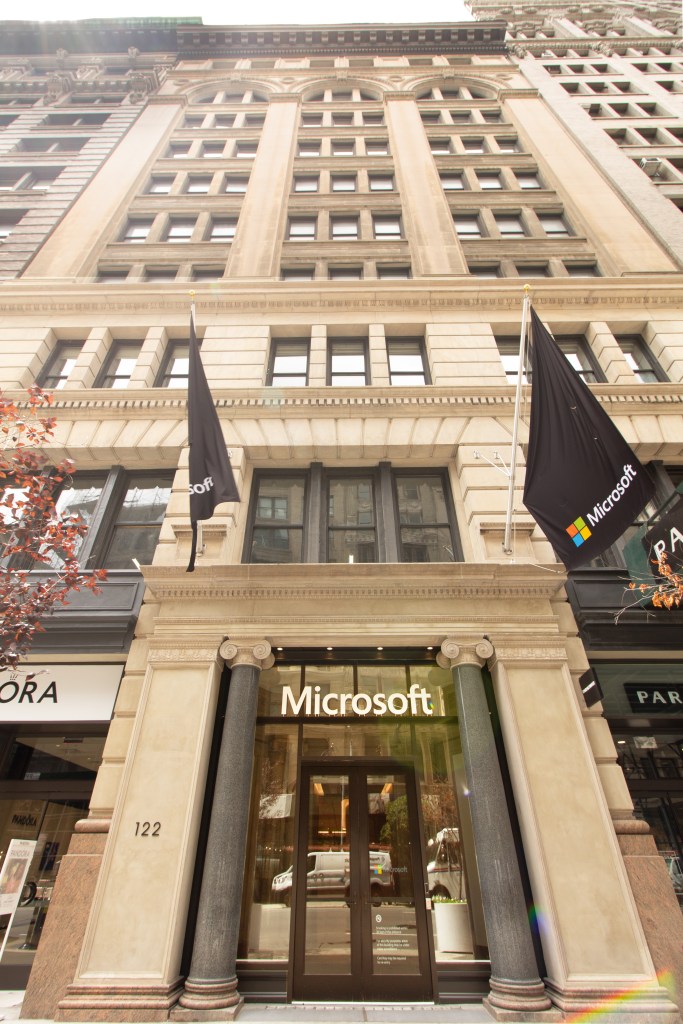 Microsoft has its own entrance in the building, which comes dressed with flagpoles.