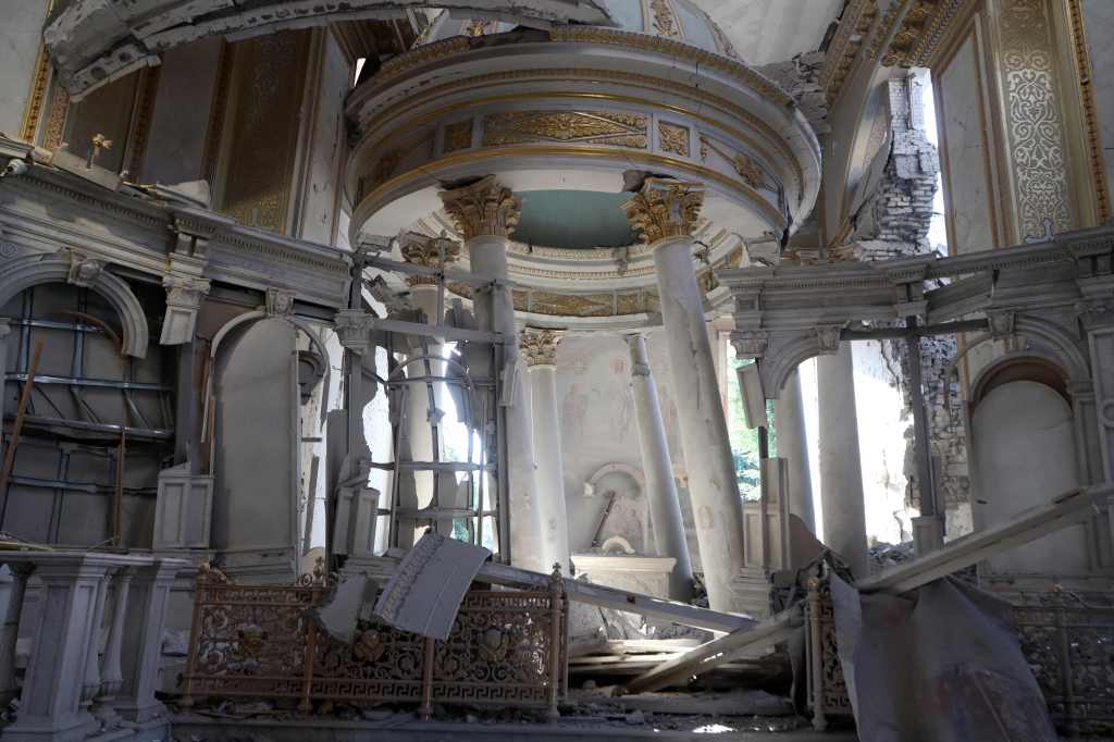 pictured is an Interior shot of the damaged church. 