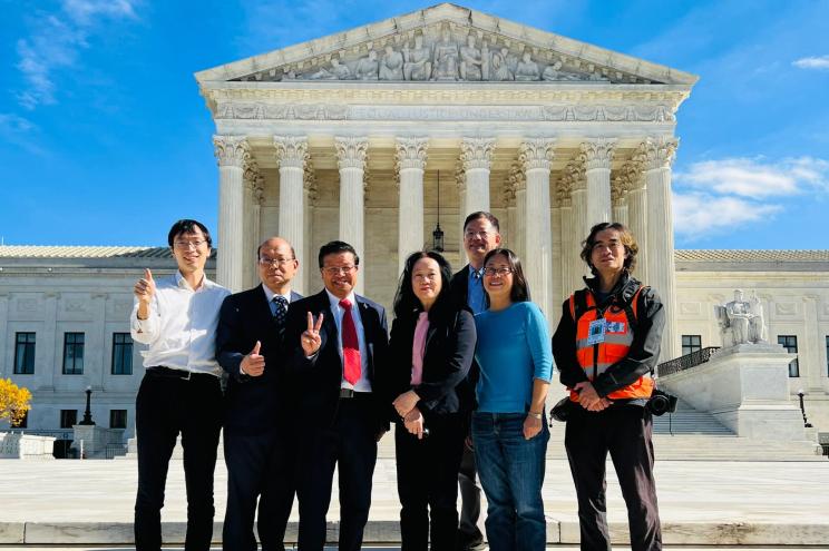 Asian-American activist Yiatin Chu(2d from right) outside of the Supreme Court building.