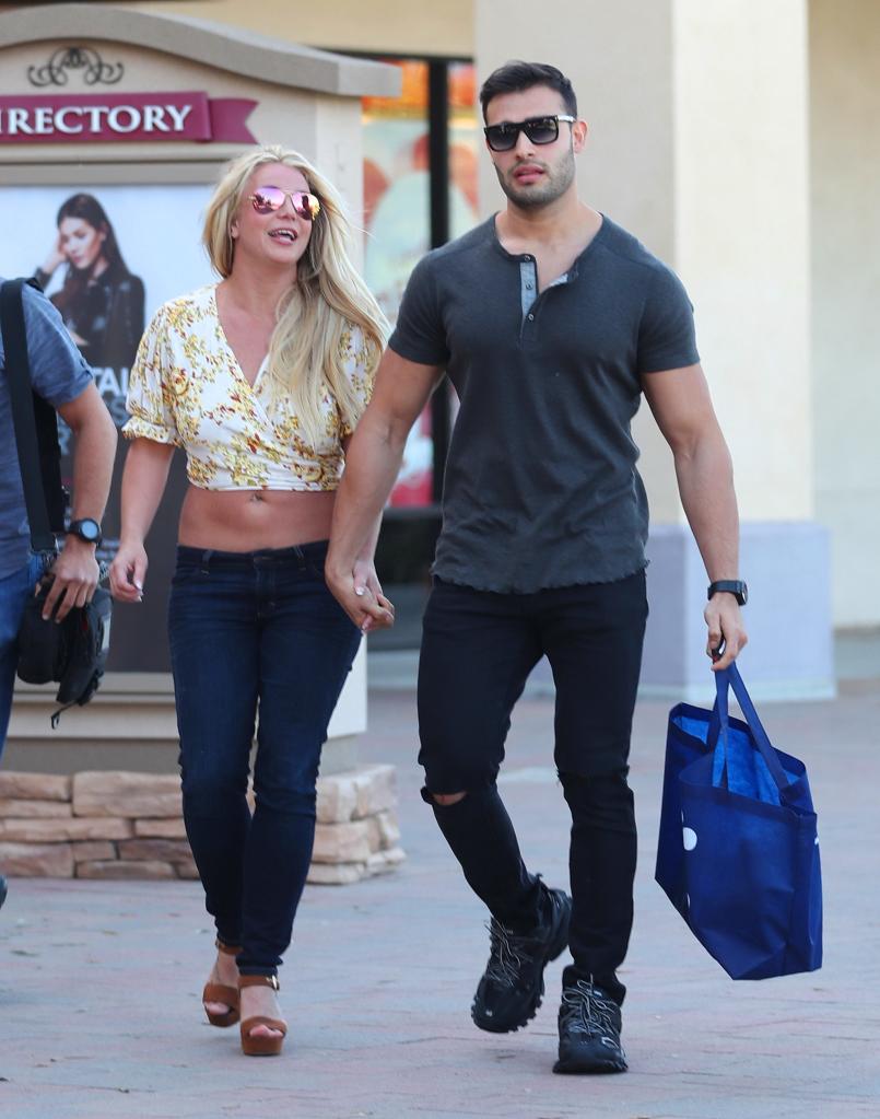 Britney Spears and her then-boyfriend Sam Asghari go shopping at an outlet mall.