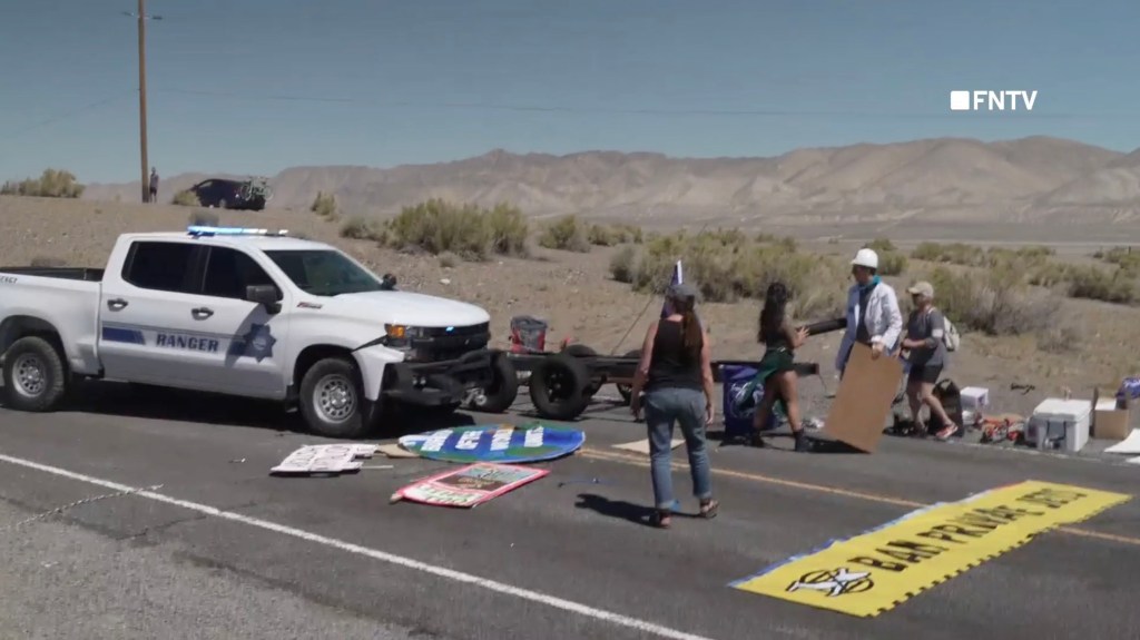 Police burst through environmental barricade