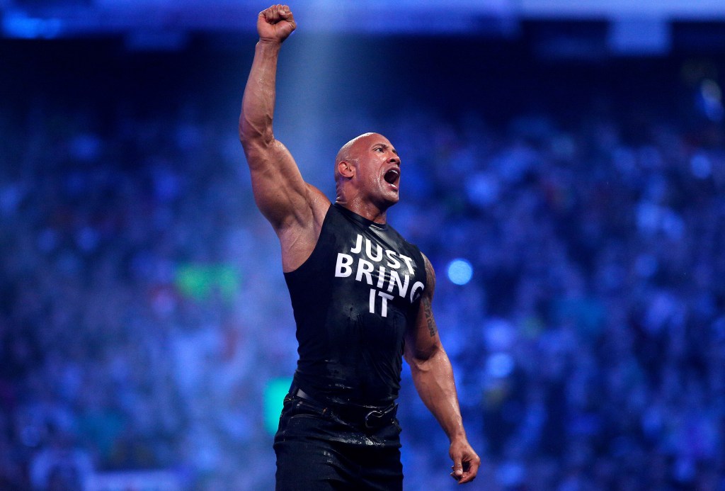 Dwayne Johnson aka The Rock reacts during Wrestlemania XXX at the Mercedes-Benz Super Dome in New Orleans on Sunday, April 6, 2014. 