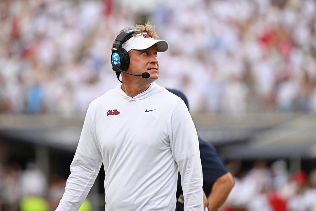 Mississippi head coach Lane Kiffin walks off the field after a time out during the first half of an NCAA college football game against Mercer in Oxford, Miss., Saturday, Sept. 2, 2023.