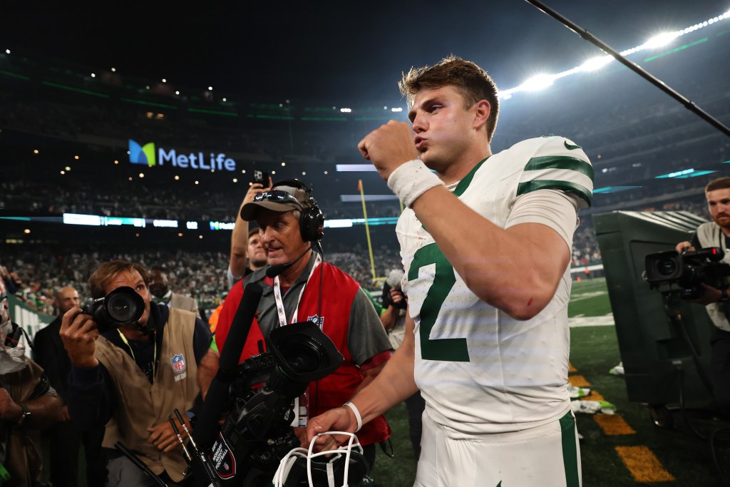 Zach Wilson celebrates the Jets' Week 1 win over the Bills.