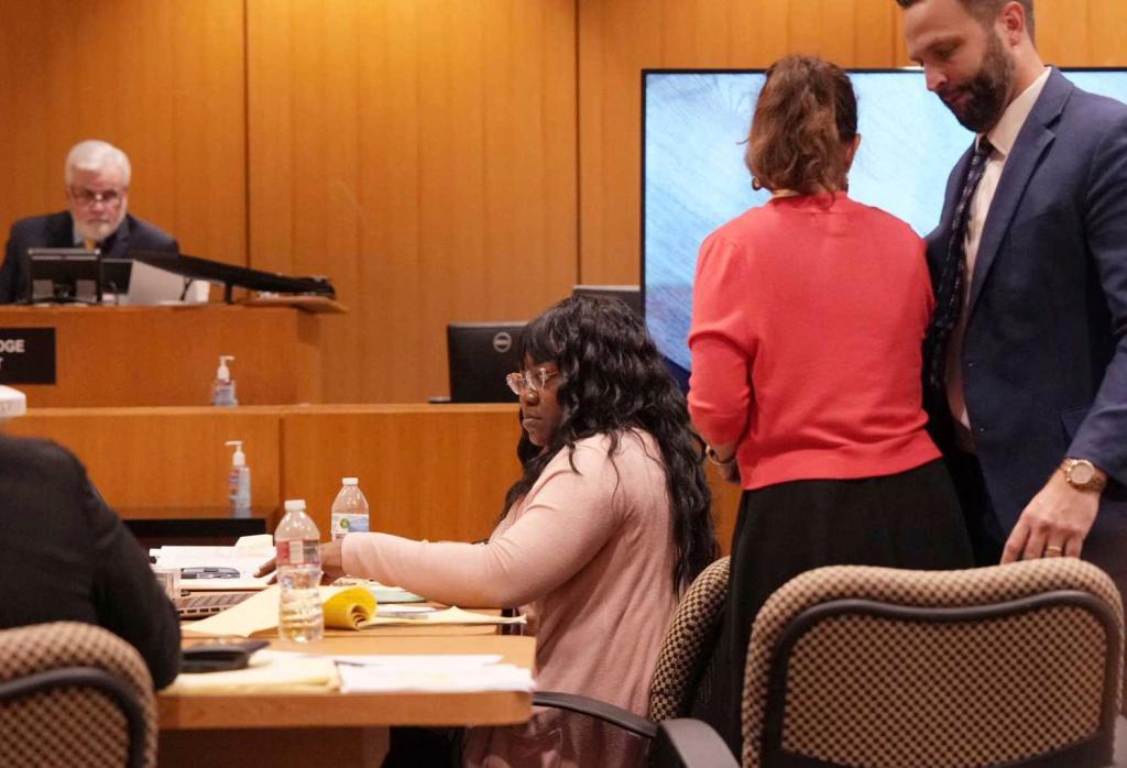 Bethaniel Jefferson and her defense attorneys prepare for a hearing before the punishment phase of her trial, Wednesday, Sept. 13, 2023, in the Family Law Building in Houston