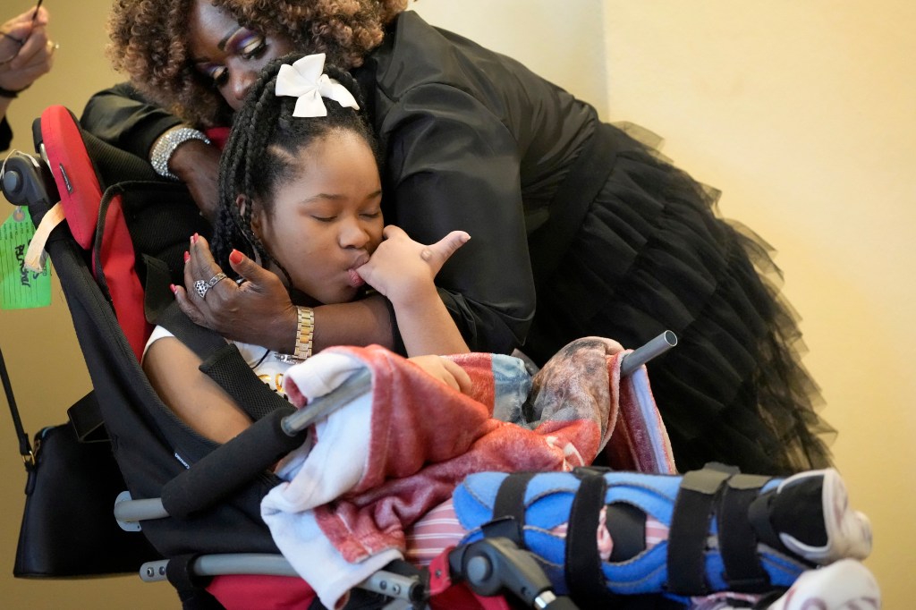 Clara Clark hugs her granddaughter, Nevaeh Hall, 11, after the child was removed from the courtroom during closing arguments in the trial of Bethaniel Jefferson Tuesday, Sept. 12, 2023, in Houston