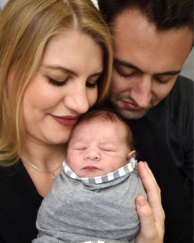 Julia, Michael Jr., and Michael III are pictured together. 