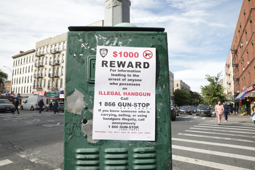 A sign near the scene of Rivera's killing.