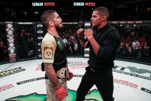 Sergio Pettis (left) faces off against Patchy Mix, his future opponent in a bantamweight title unification bout, after defending his title against Patricio Pitbull in June.