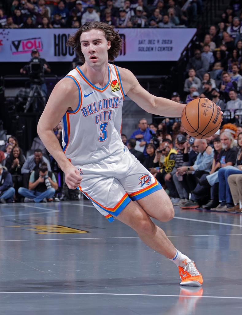 Josh Giddey #3 of the Oklahoma City Thunder dribbles the ball during the game against the Sacramento Kings during the In-Season Tournament on November 10, 2023 at Golden 1 Center in Sacramento, California. 