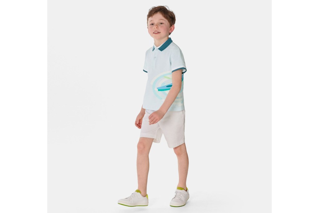 young boy wearing polo and shorts from Jacadi