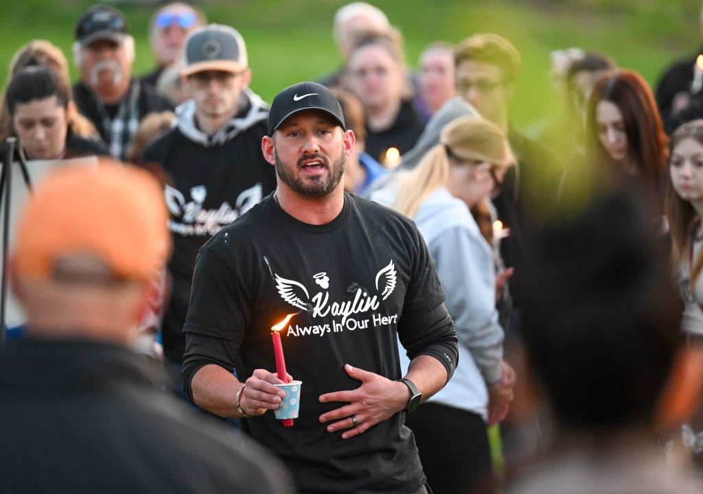 Family members and friends gather for a candlelight vigil honoring Kaylin Gillis in Fort Hardy Park in Schuylerville, N.Y. Thursday, April 20, 2003. Gillis was shot and killed when she was riding in a car that got lost and pulled into the wrong driveway in Hebron, Washington County. N.Y.