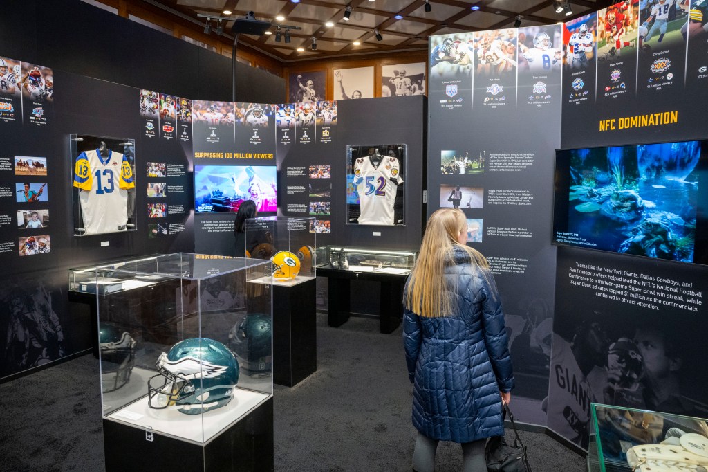 Visitor at new Paley Center exhibit, "Beyond the Big Game"