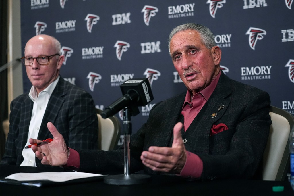 CEO Rich McKay (l.) and owner Arthur Blank (r.) hired Raheem Morris as the Falcons' next head coach.