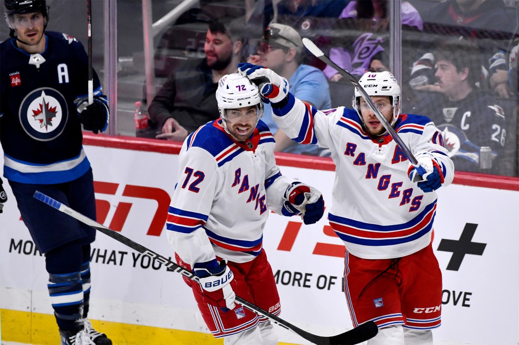 Filip Chytil celebrates a goal with Artemi Panarin during the Rangers' game against the Jets in October.