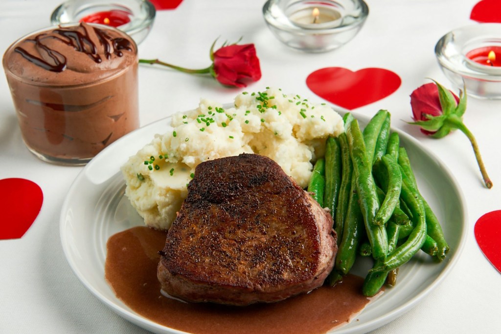 steak and mash potatoes with greens