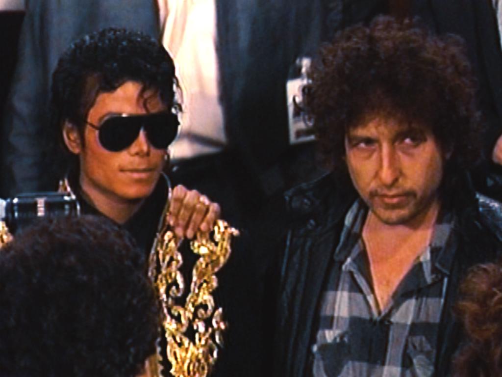 Michael Jackson and Bob Dylan at the "We Are the World" recording session.