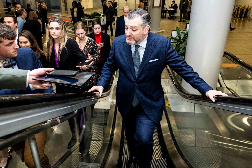 Sen Ted Cruz on an escalator 