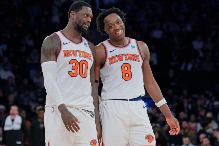 New York Knicks forward OG Anunoby #8 is all smiles as he speaks with New York Knicks forward Julius Randle #30 during the fourth quarter. The New York Knicks defeated the Washington Wizards 113-109.