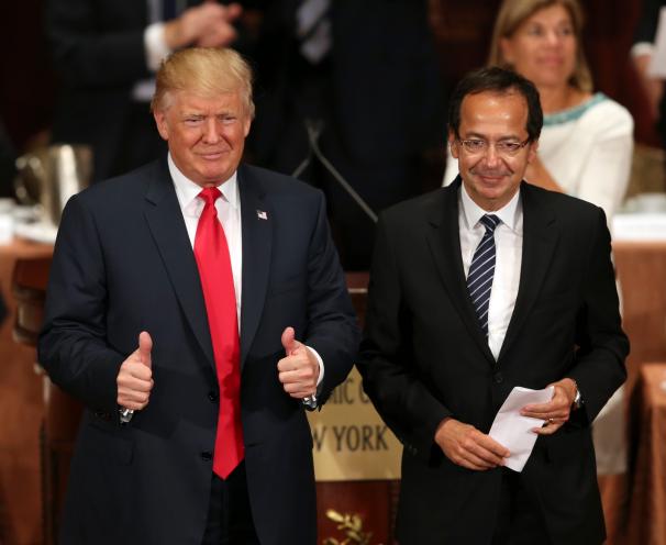 Donald Trump and John Paulson in suits giving thumbs up at a luncheon for the Economic Club of New York on Sept 15, 2016.